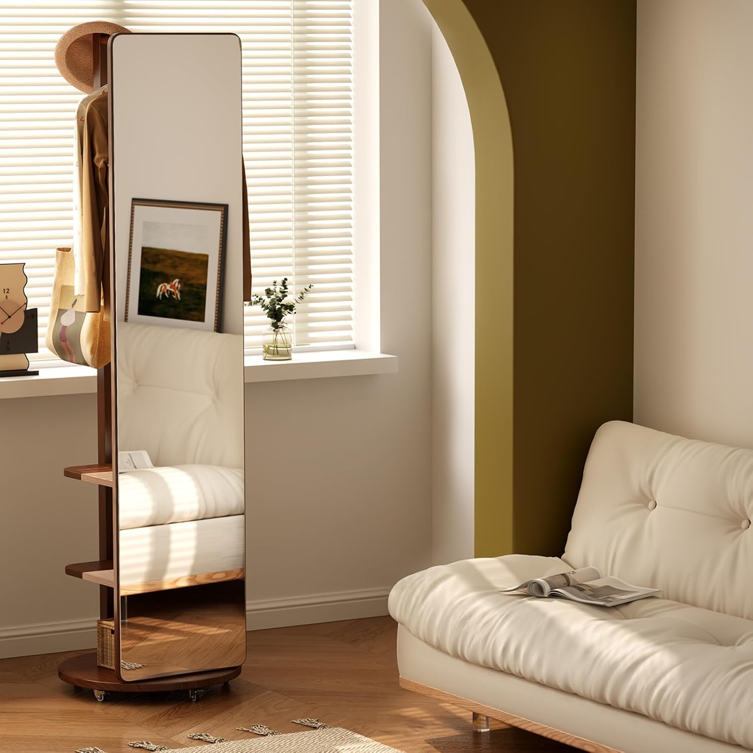 Full-length front view of the Nestwist mirror with round wheeled base